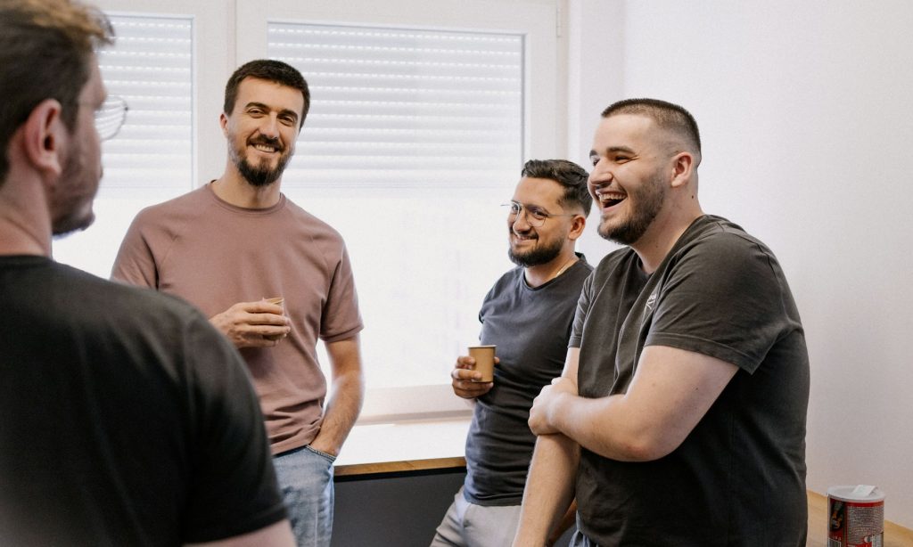 A group of men together in an Irish social setting