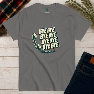 Charcoal grey Bye Bye Bye Bye Irish saying T-shirt with bold cream typography and vintage telephone illustration on a wooden background