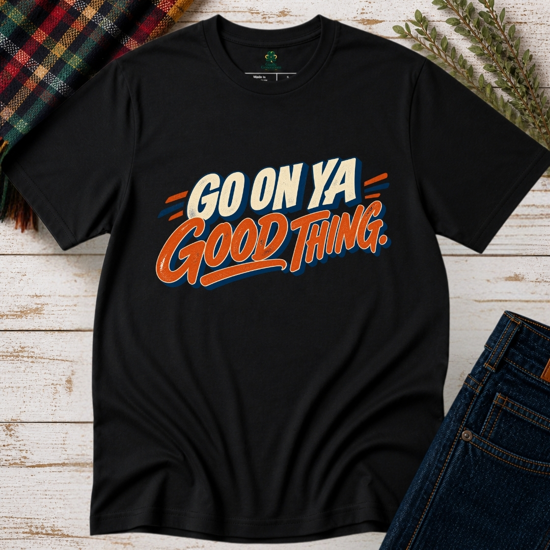 Black Go On Ya Good Thing Irish graphic T-shirt featuring bold cream and orange retro typography with navy outlines