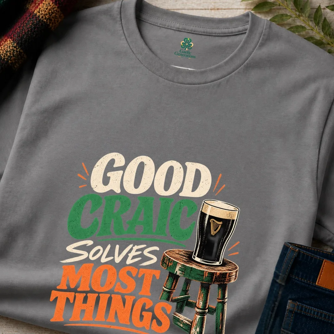 Close-up of the charcoal Good Craic Solves Most Things Irish T-Shirt with cream, green and orange print
