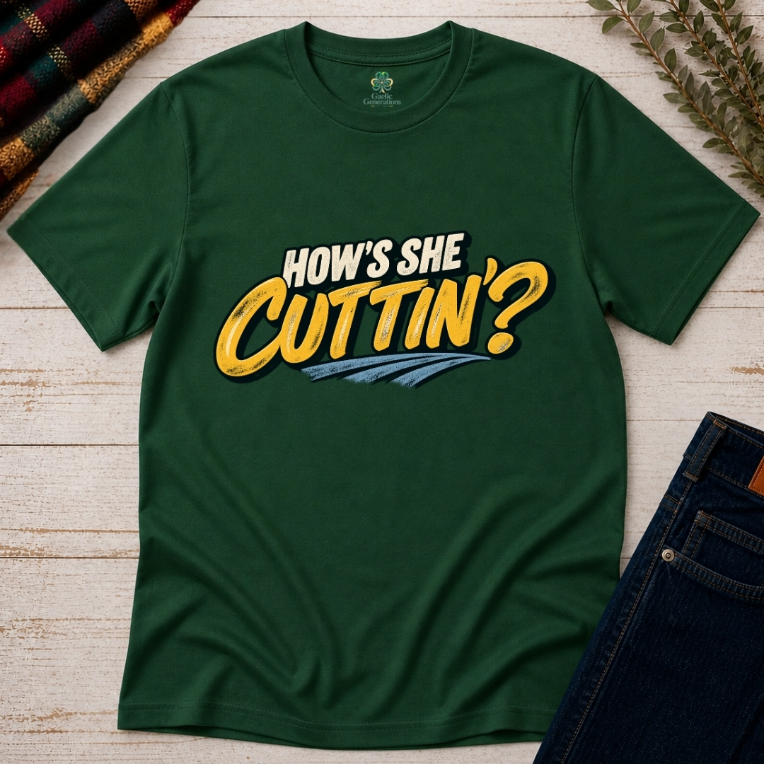 Forest green How's She Cuttin' T-shirt laid flat on rustic wood, featuring vintage cream and yellow Irish greeting graphic