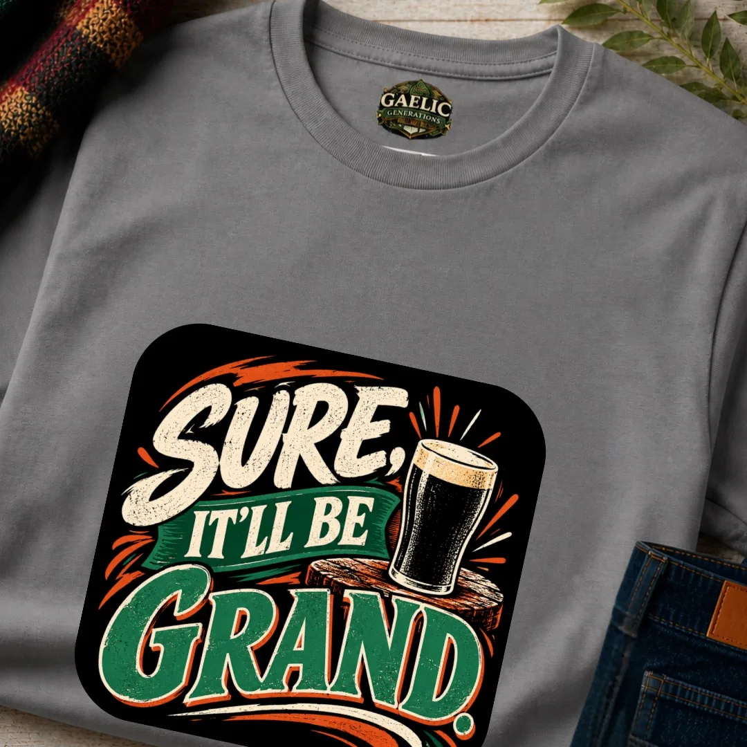 Close-up of the charcoal Sure, It’ll Be Grand Irish T-Shirt showing the vintage pint and typography design